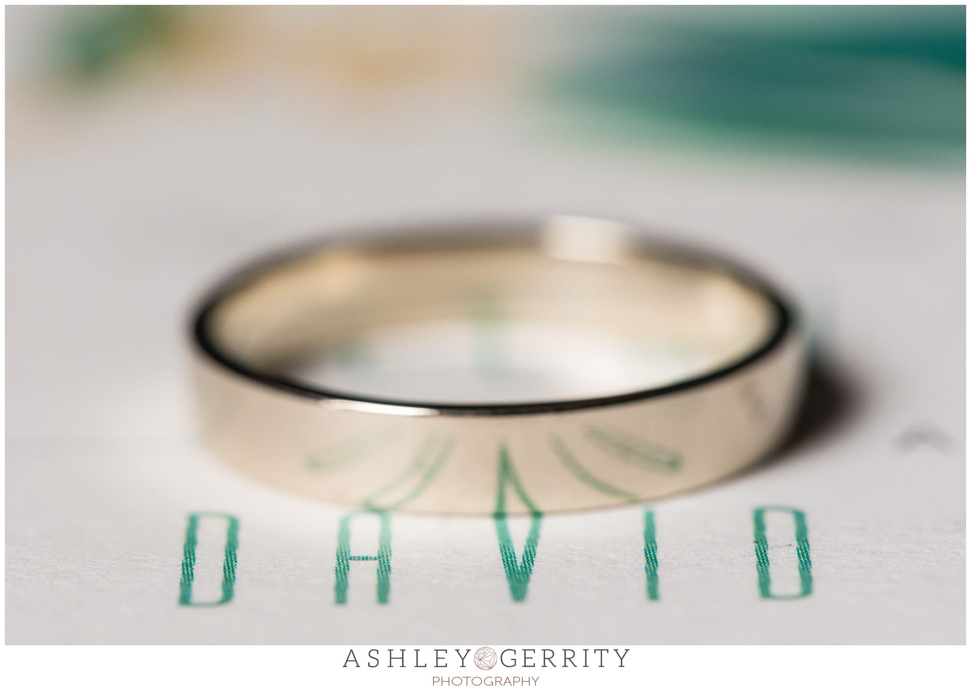 Grooms wedding band detail and name