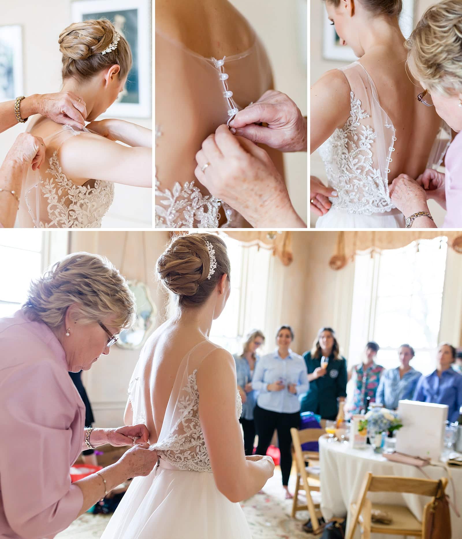 Mother of the bride helping bride into dress, buttoning wedding gown, lace wedding gown