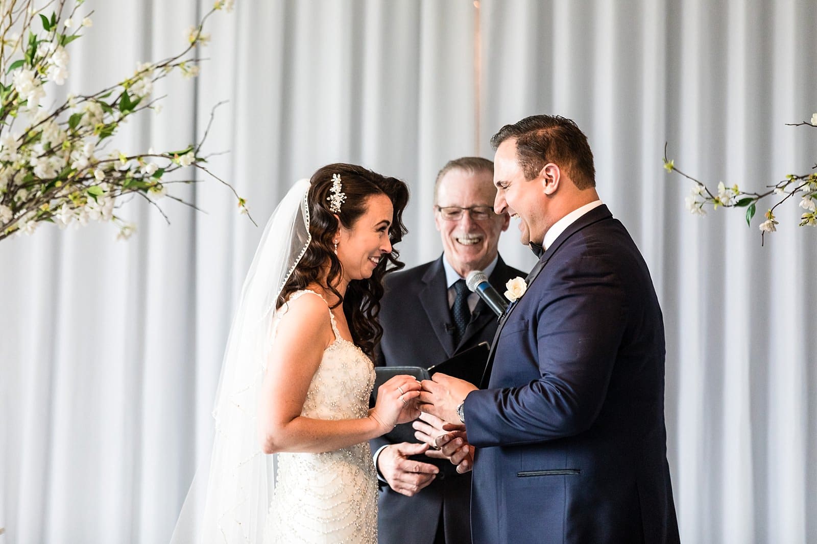 Bride and Groom exchanging rings, wedding ceremony