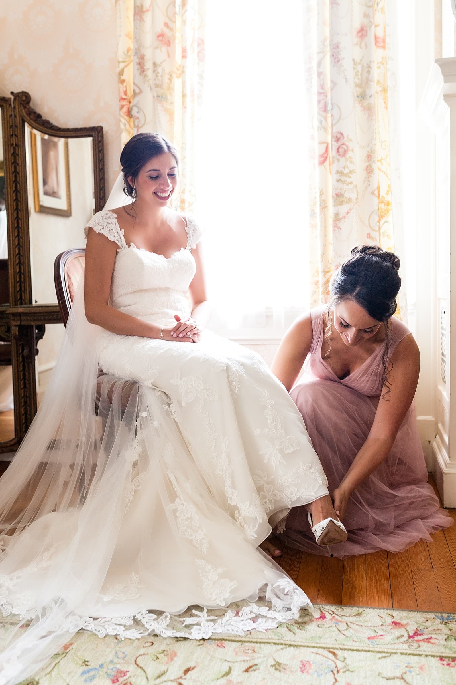 Bridal prep, bride getting ready, weddings shoes, bridesmaid helping bride