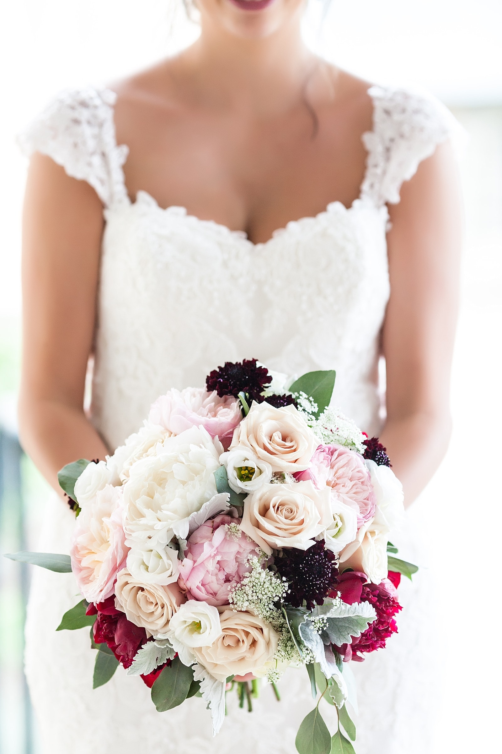 Bridal portrait, bridal bouquet, flowers, wedding gown 