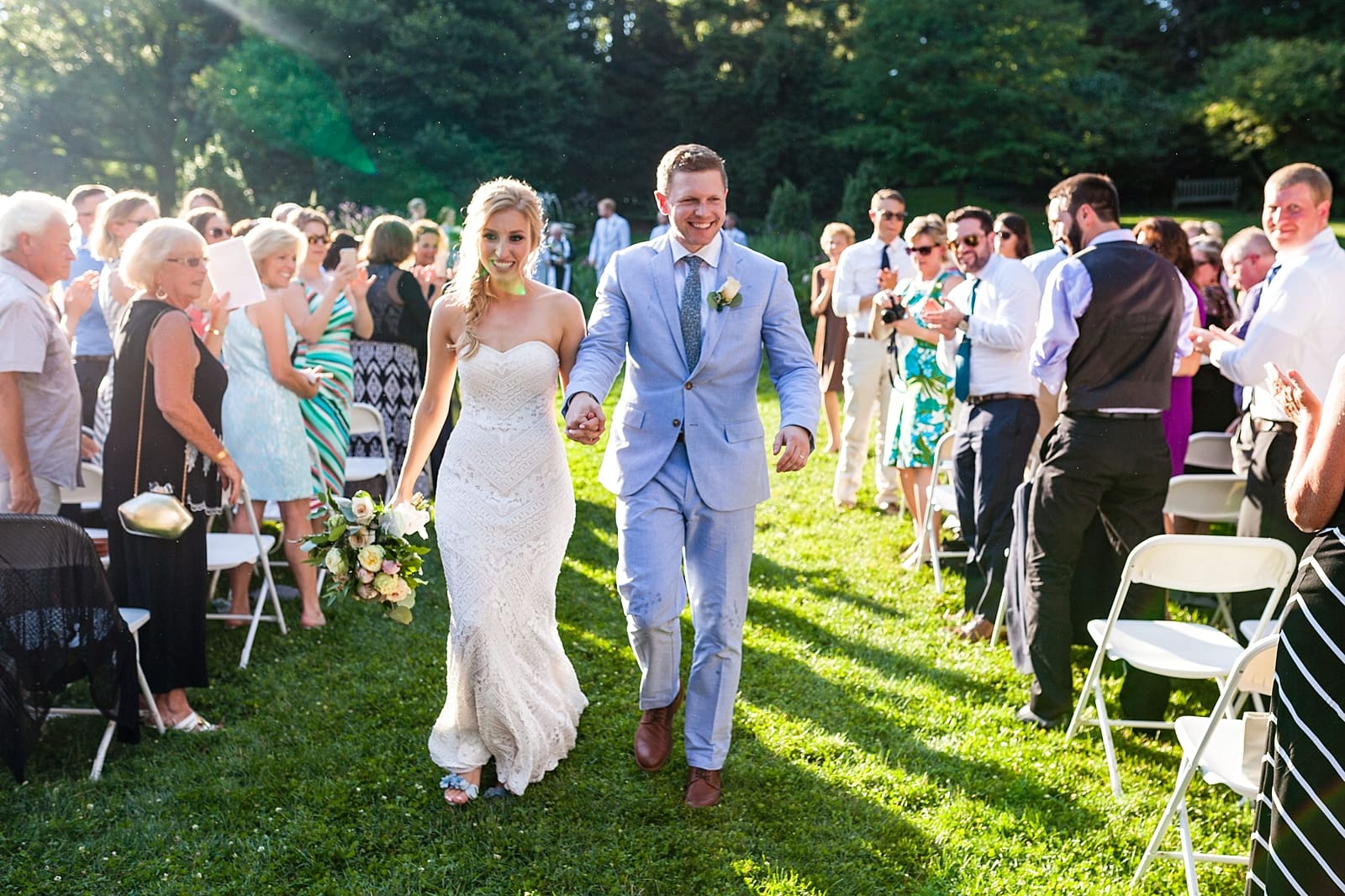 husband and wife, bride and groom, wedding recession, newly weds, Morris Arboretum wedding