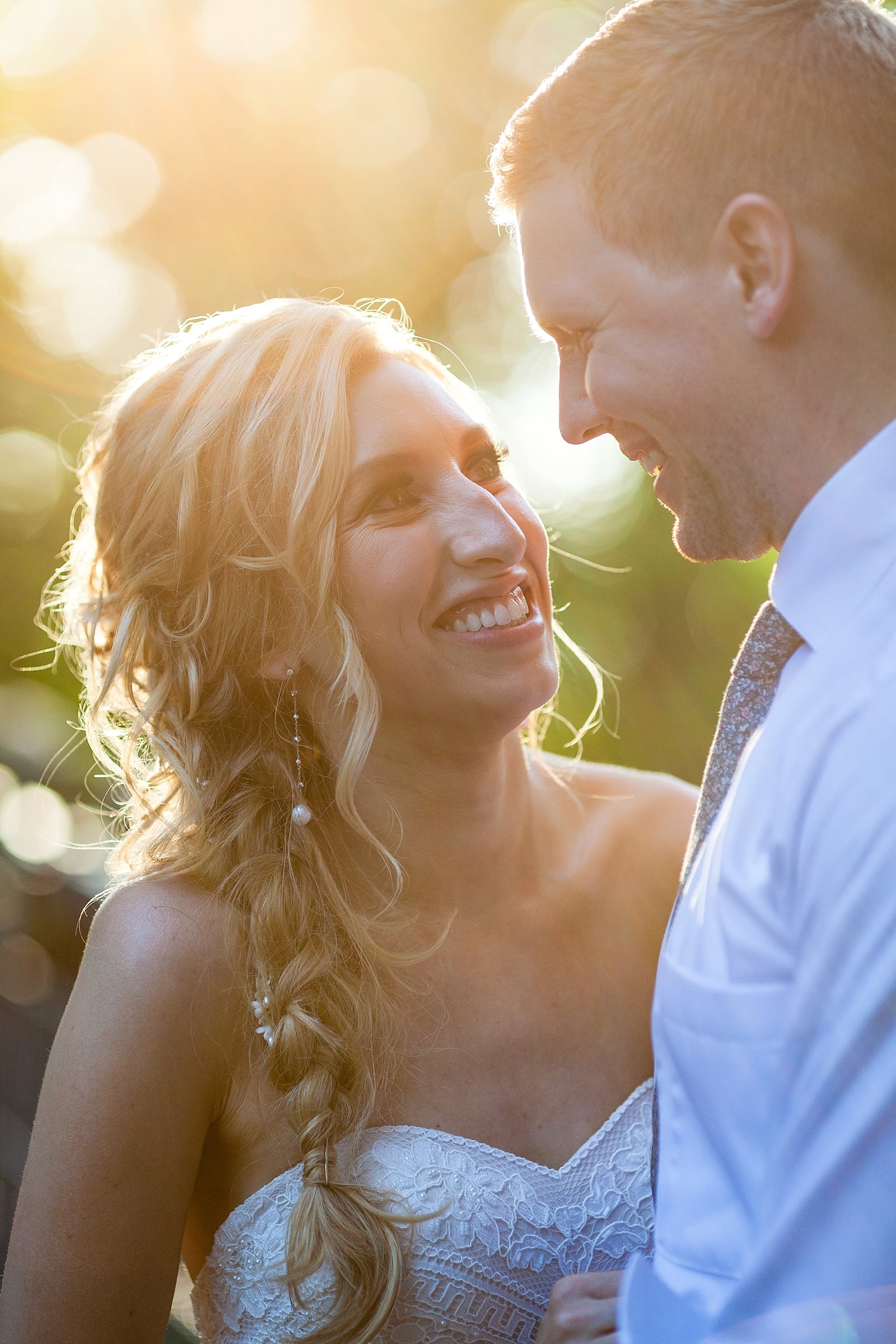 bride and groom, husband and wife, wedding portrait, sunlight portrait, sunset, sun flare, lens flare