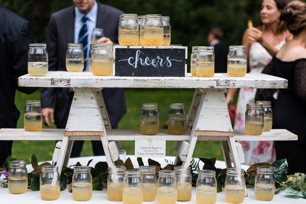signature drink, arnold palmer, mason jar glasses, rustic wedding reception, cheers sign,