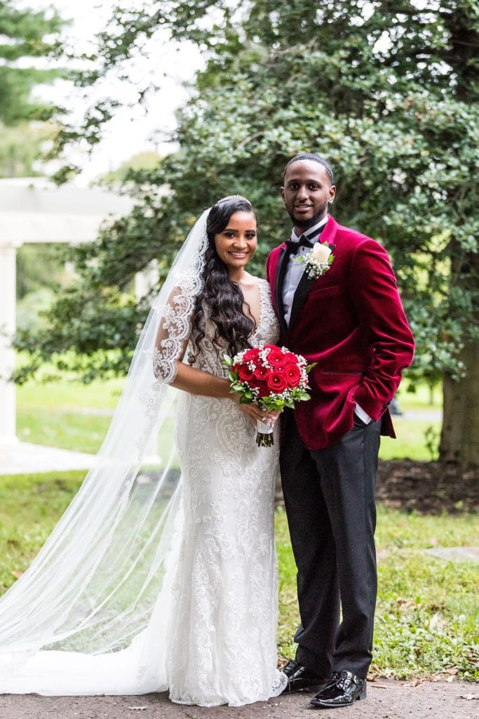 Bride & groom smile for their wedding portraits at their Collingswood Ballroom wedding