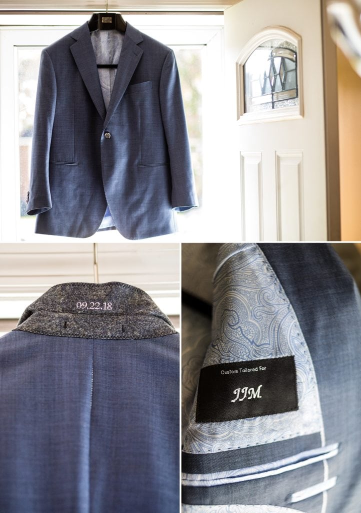 Groom's blue & grey custom Enzo suit monogrammed with his initials and wedding date on the lapel.