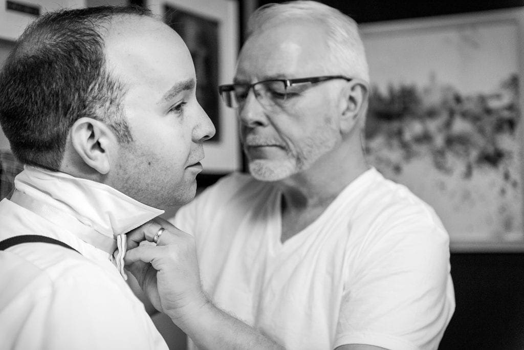 father of the groom, bowtie, getting dressed