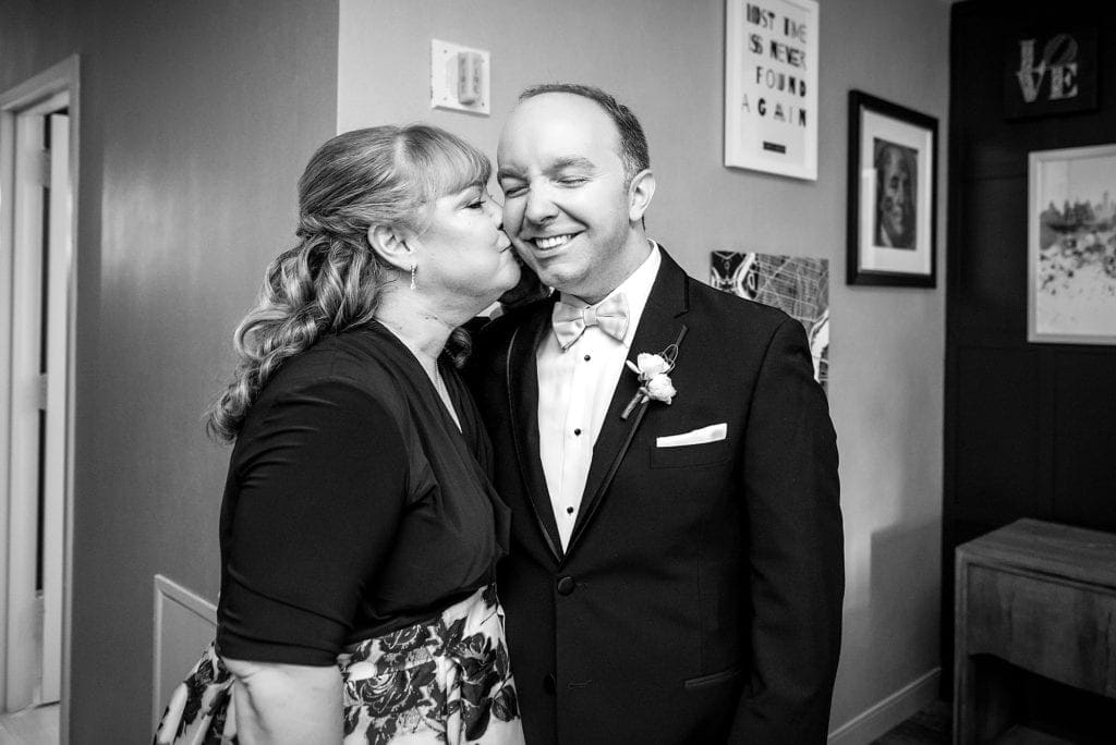 mother of the groom, kiss on the cheek, mother son