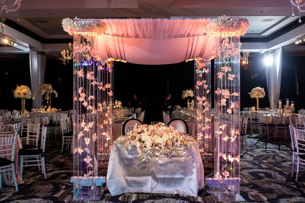 sweetheart table, chuppah, orchids, beautiful blooms, vie, cescaphe