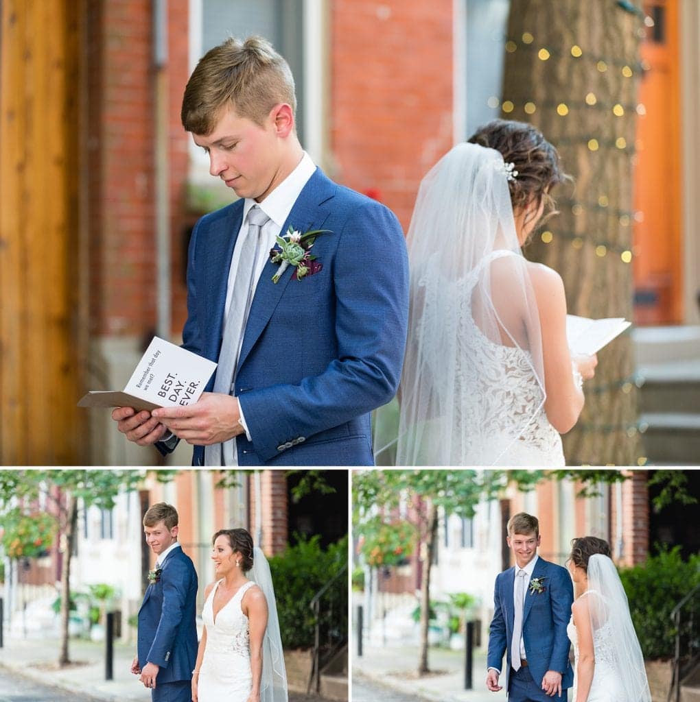 Bride & groom reading letters they had written for each other while standing back to back before their first look on Addison St in Philadelphia