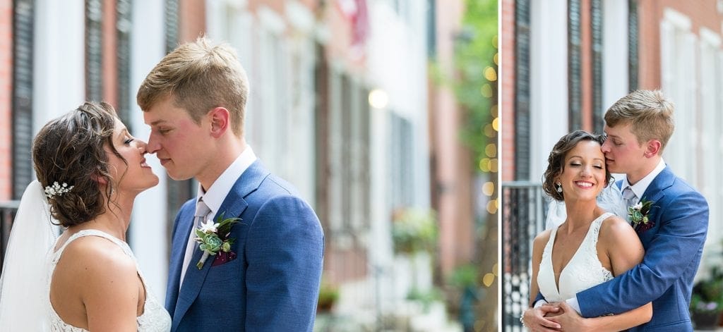 Bride & Groom embrace for wedding portraits on Addison St in Philadelphia before their Kimmel Center Wedding