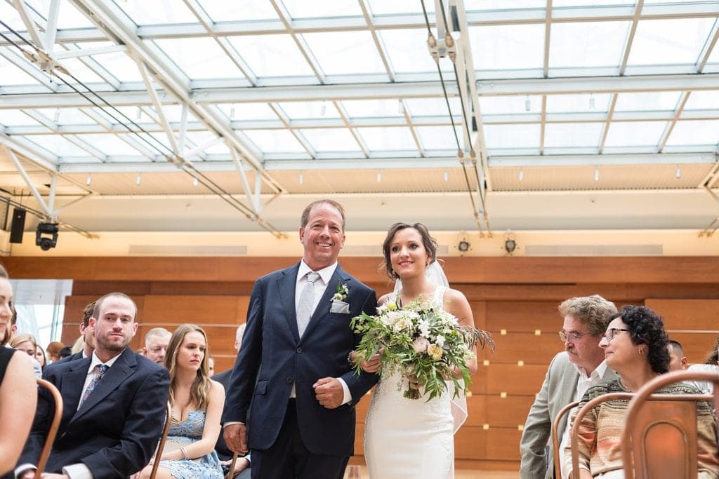 Bride walking down the aisle with her father for her Kimmel Center wedding