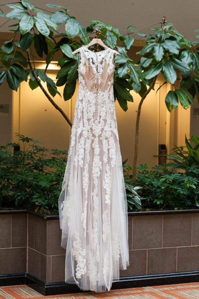 Back detail of sheer lace wedding dress