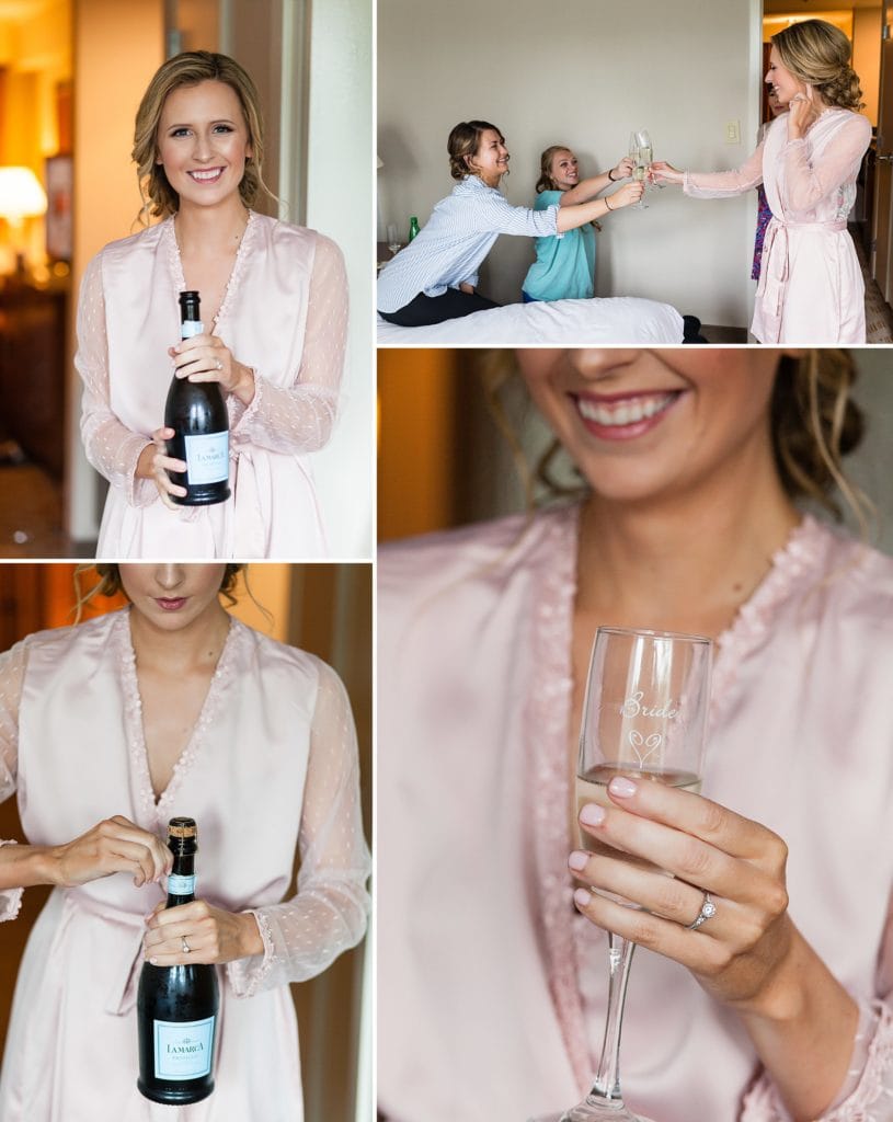 Bride pops a bottle of champagne and toasts with her wedding party