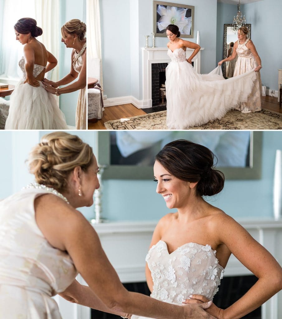 bride getting dressed with her mother's help at the Manor House at Prophecy Creek