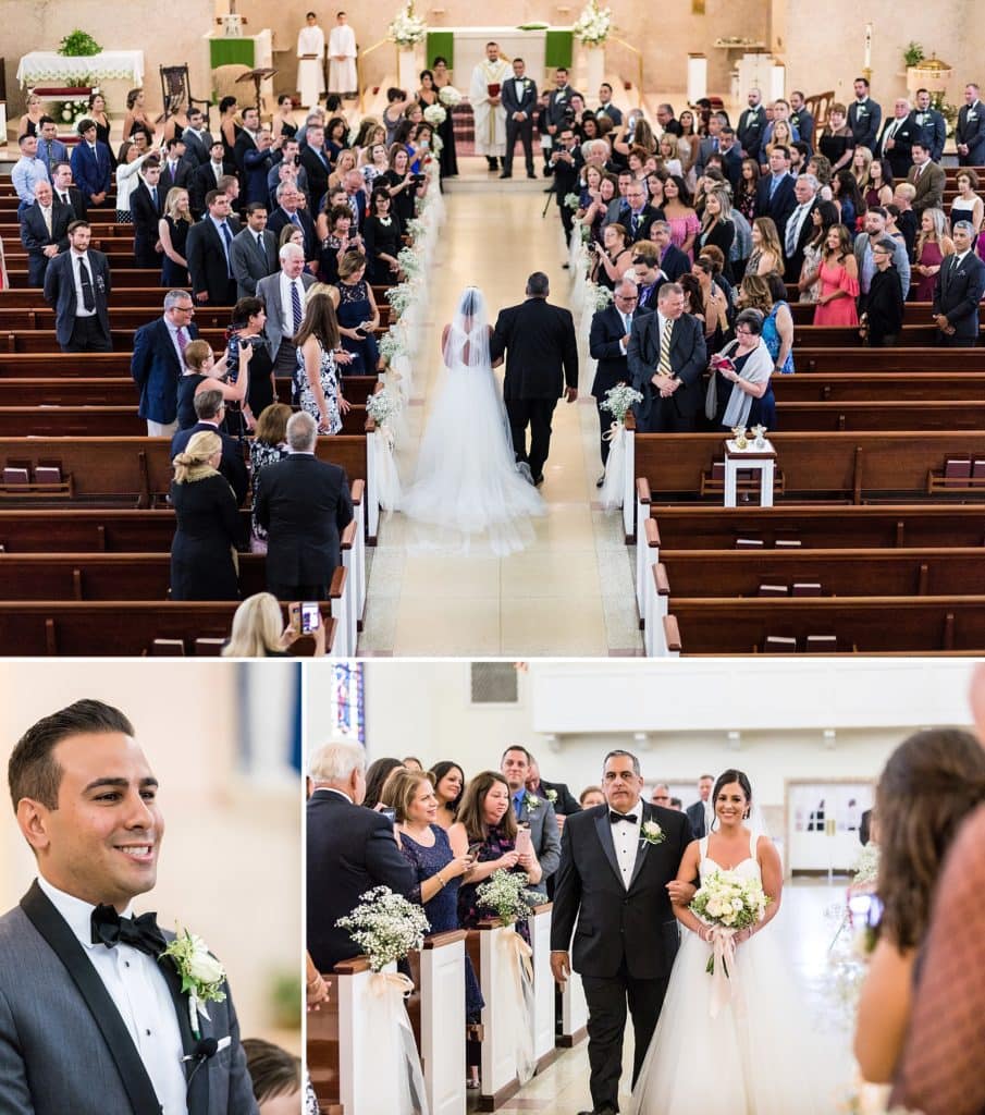 Groom smiles as bride is walked down the aisle by her father. As shot from the choir loft.