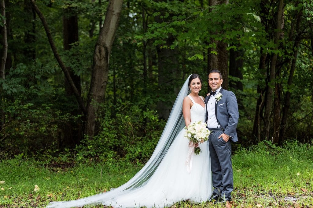 Bride & groom smile for a wedding photo before their Mendenhall Inn Wedding