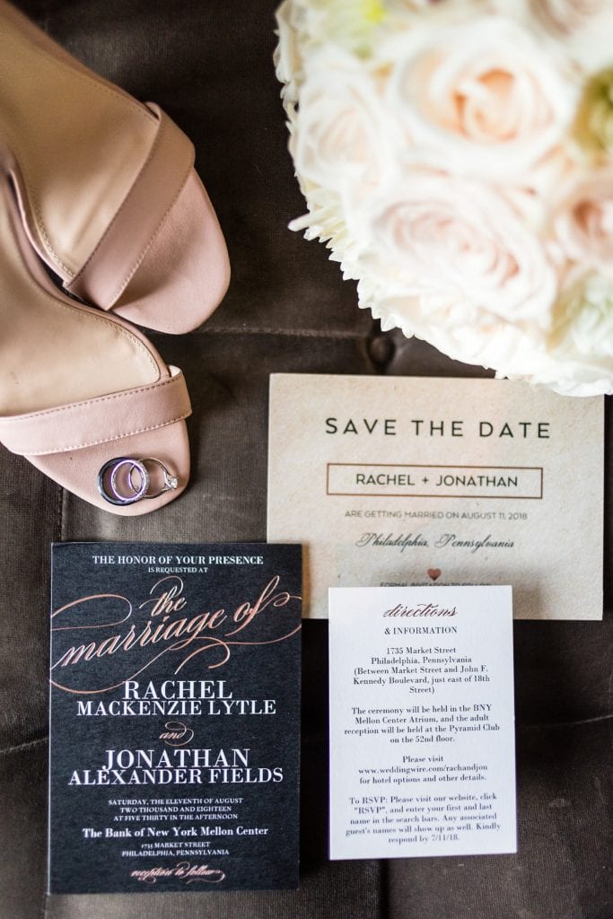 invitation suite, blush shoes, bridal bouquet, wedding rings, save the date