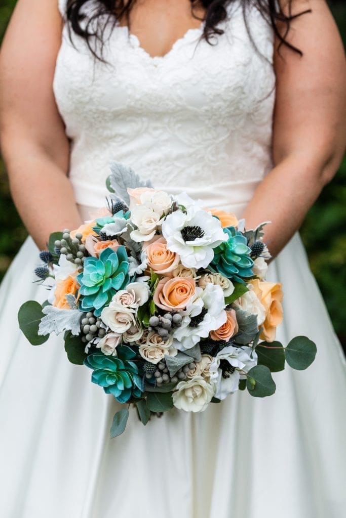 detail of bridal bouquet, peach and turquoise bouquet, real and faux bouquet