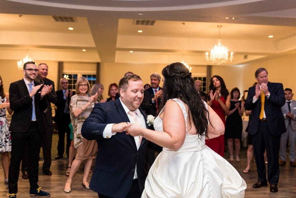 bride and groom dancing, wedding reception
