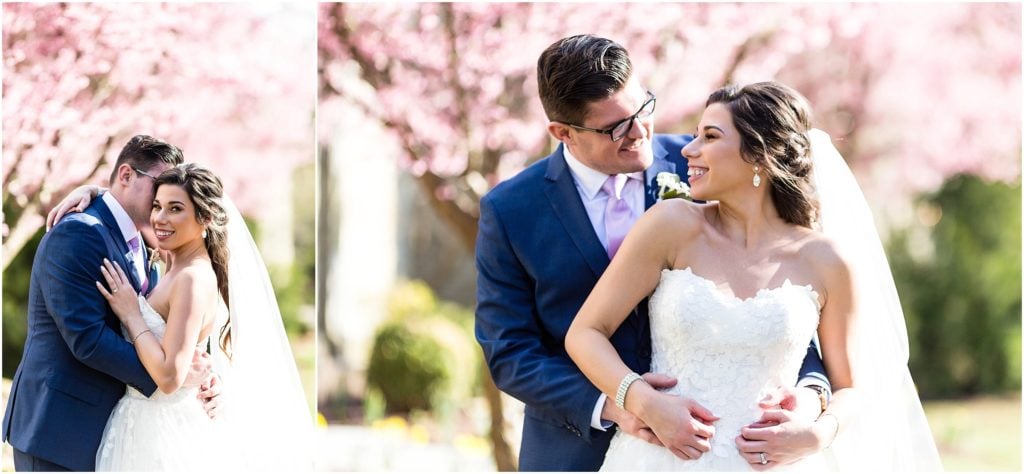 Bride in Pronovias dress sharing tender moments with her new husband surrounded by spring blossoms | Ashley Gerrity Photography www.ashleygerrityphotography.com