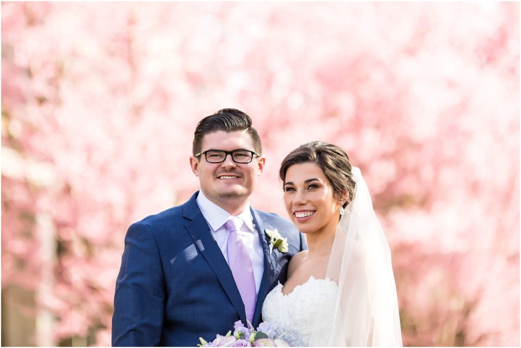 Bride and groom portraits with a backdrop of spring blossoms | Ashley Gerrity Photography www.ashleygerrityphotography.com