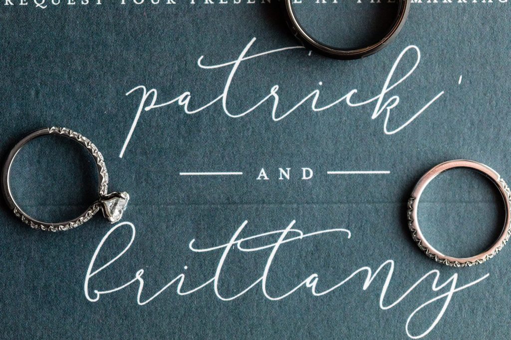 Minted wedding invites provide backdrop for D'Antonio & Klein wedding rings | Ashley Gerrity Photography www.ashleygerrityphotography.com