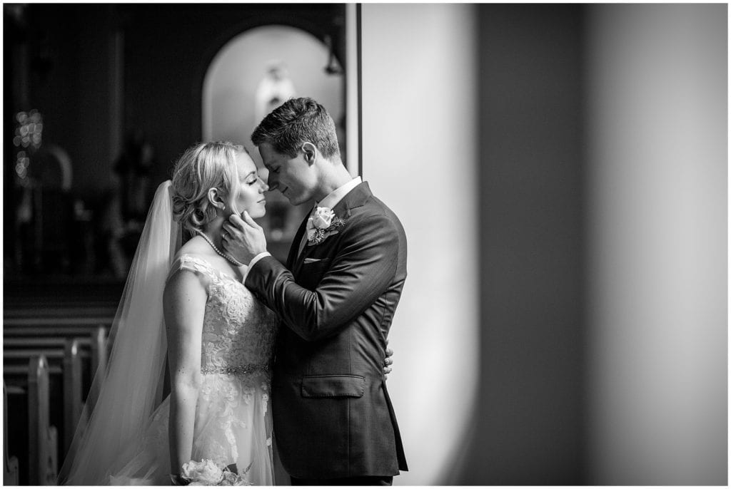 Tender moments between bride and groom after church wedding | Ashley Gerrity Photography www.ashleygerrityphotography.com
