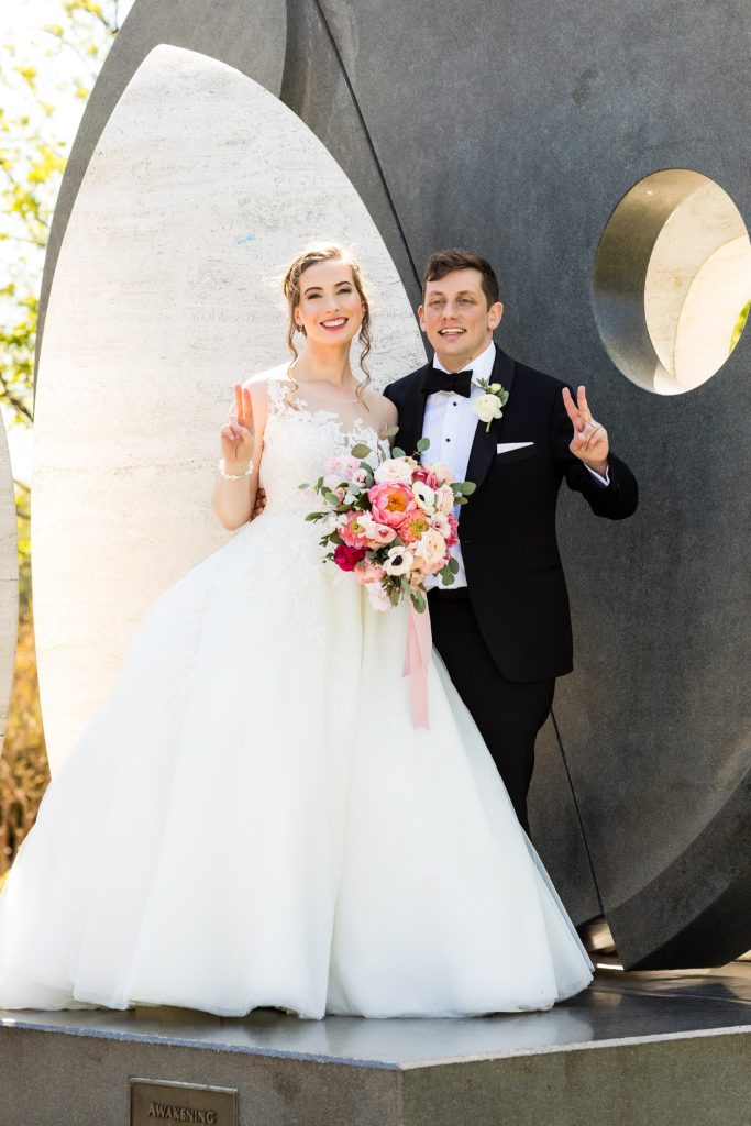 Bride and groom pose for photo at the oreo on Villanova campus | www.ashleygerrityphotography.com