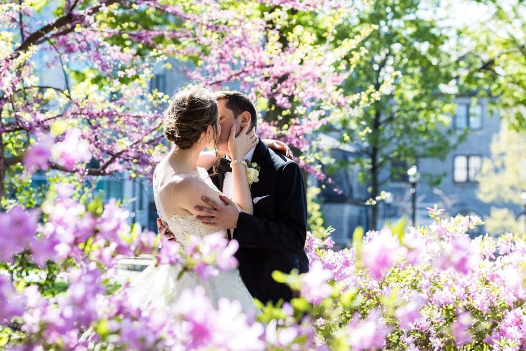 Bride and Groom amidst Spring blossoms at Villanova Wedding | www.ashleygerrityphotography.com