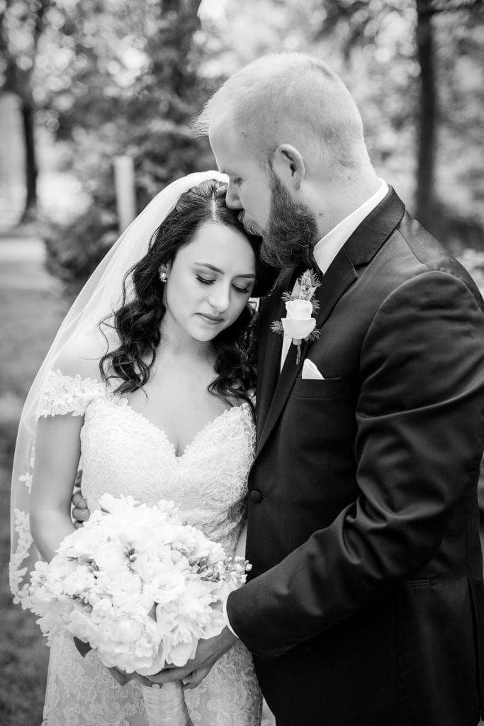 Tender moment between bride and groom at Anthony Wayne House Wedding | Ashley Gerrity Photography www.ashleygerrityphotography.com