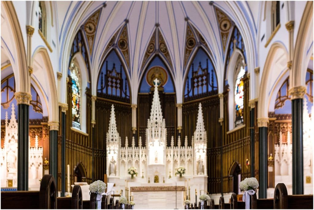 Interior of St John the Evangelist Church in Philadelphia decorated for a wedding ceremony