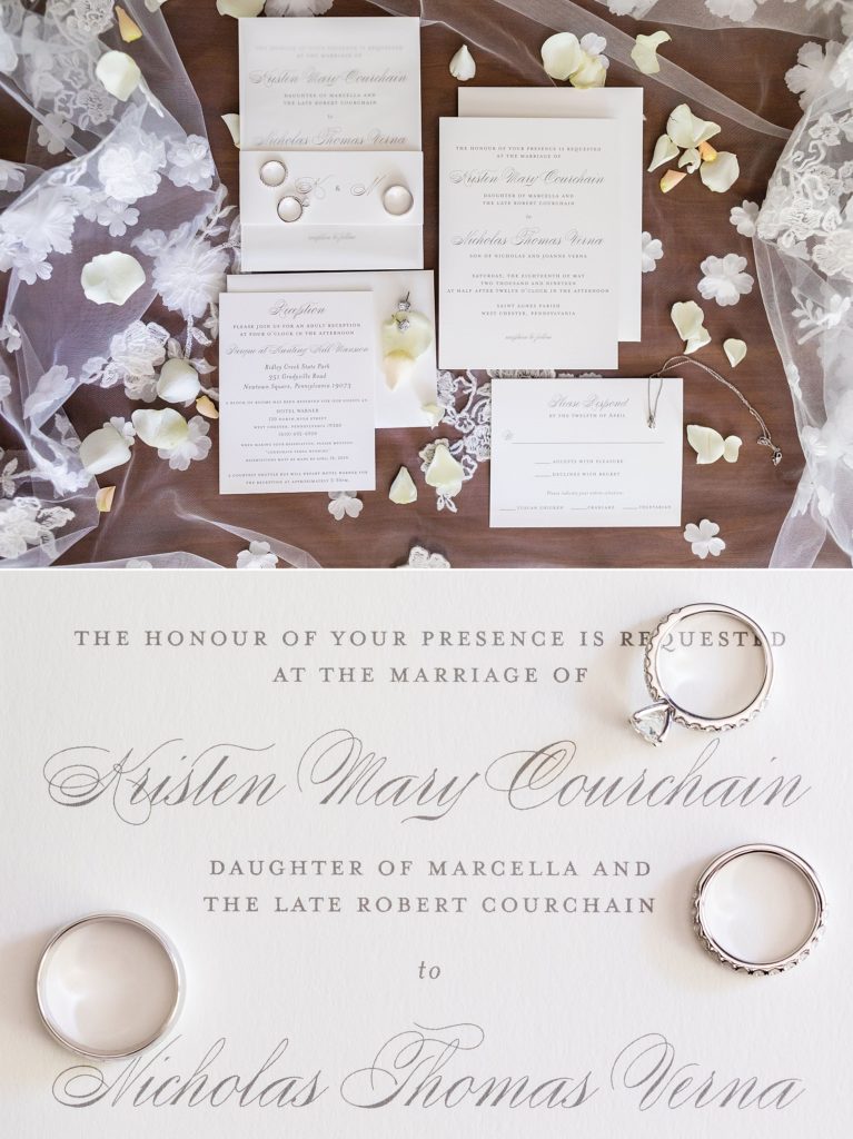 Beautiful wedding invites from Minted styled with rings from AR Morris Jewelers and loose petals from Ann Ottley Floral Design | Ashley Gerrity Photography www.ashleygerrityphotography.com