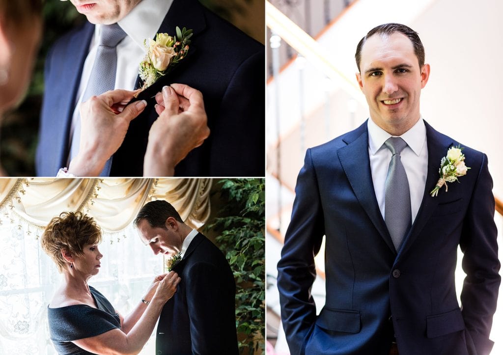 Groom being helped with his boutonniere from Ann Ottley Floral Design | Ashley Gerrity Photography www.ashleygerrityphotography.com