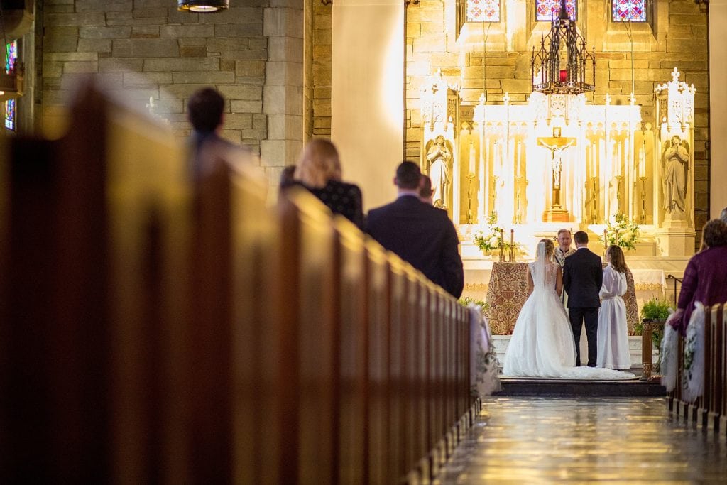 Bride and groom at the altar in St Agnes Parish Church | Ashley Gerrity Photography www.ashleygerrityphotography.com