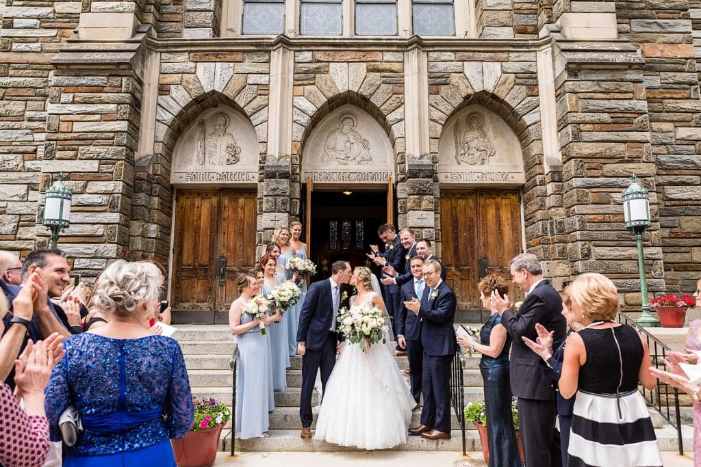 Post wedding exit at St Agnes Parish Church | Ashley Gerrity Photography www.ashleygerrityphotography.com