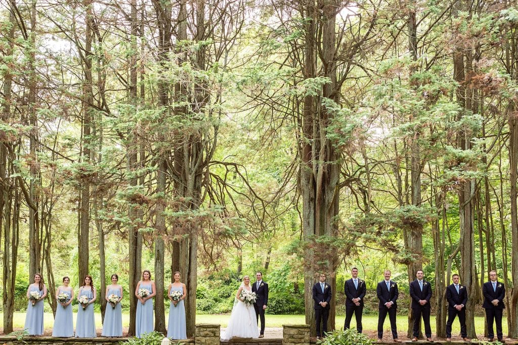 Wedding party posing in the trees at Parque Ridley Creek Wedding | Ashley Gerrity Photography www.ashleygerrityphotography.com