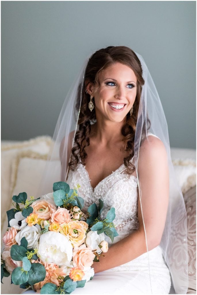 traditional bridal portrait with florals and veil