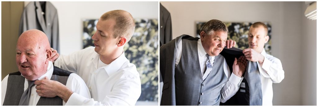 groom getting ready with his family before wedding