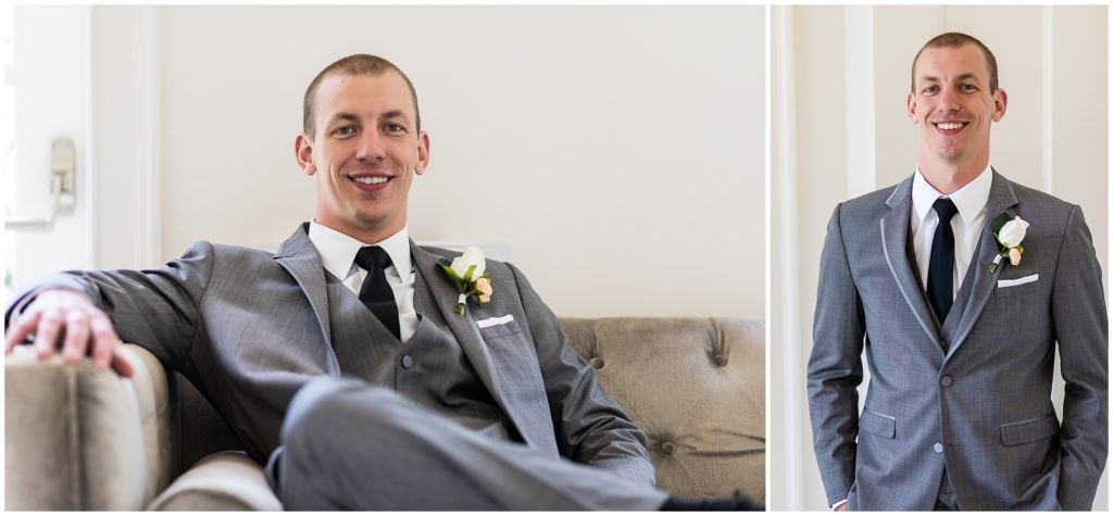 traditional groom portrait with grey suit and white and orange florals