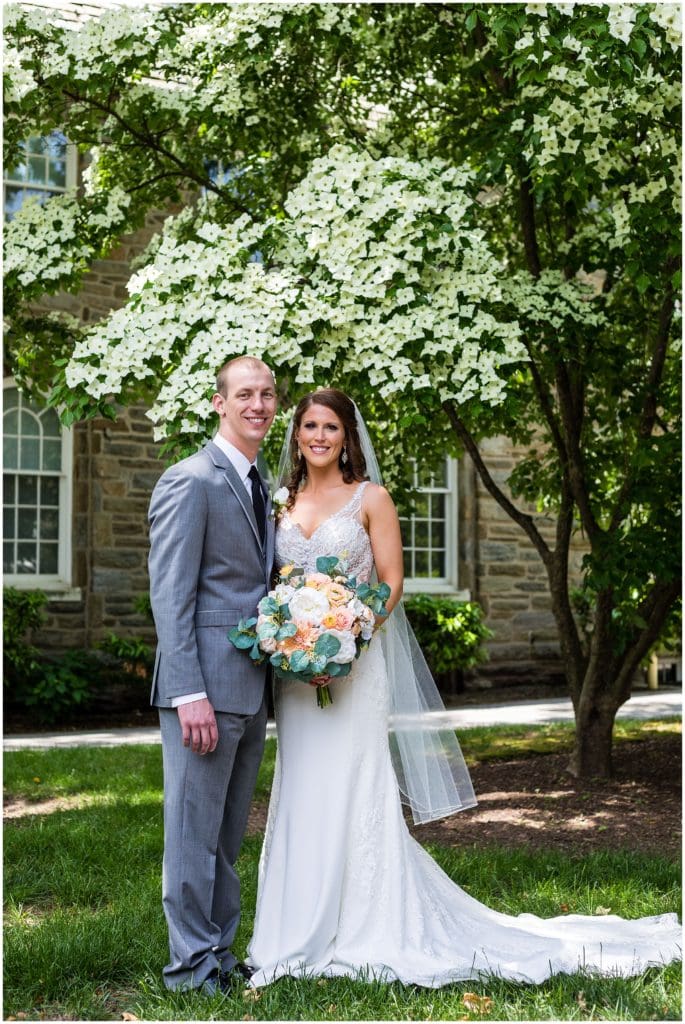 traditional bride and groom portrait outside the Ballroom at Ellis Preserve