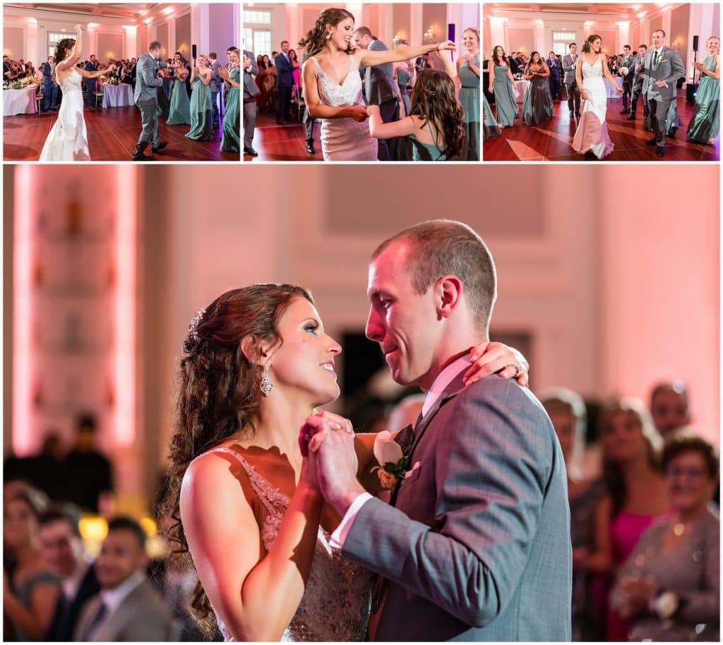 bride and groom dancing with each other and family during reception