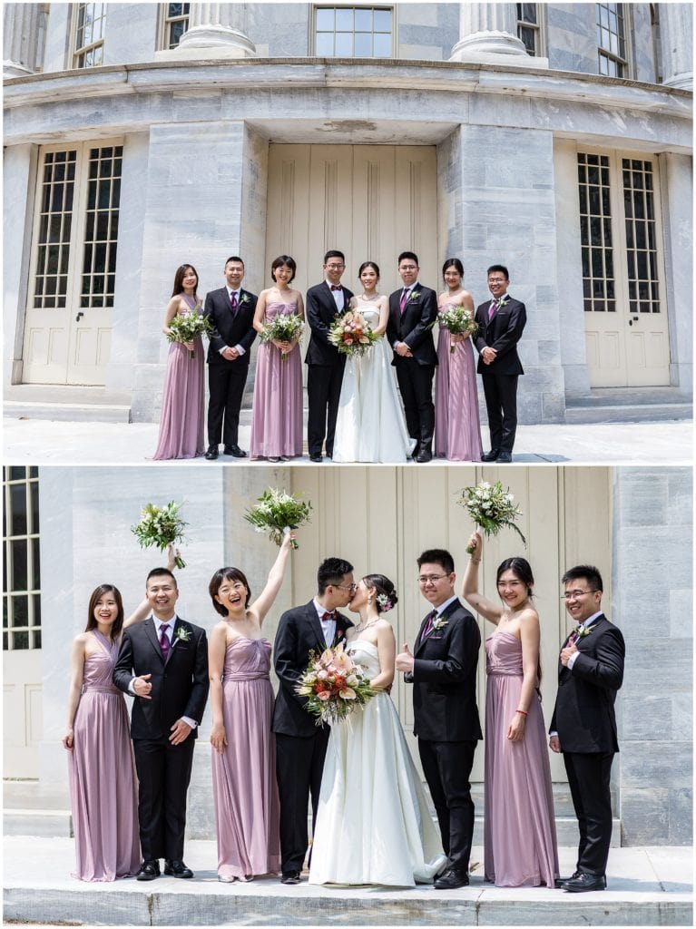 bridal party portraits in front of marble building