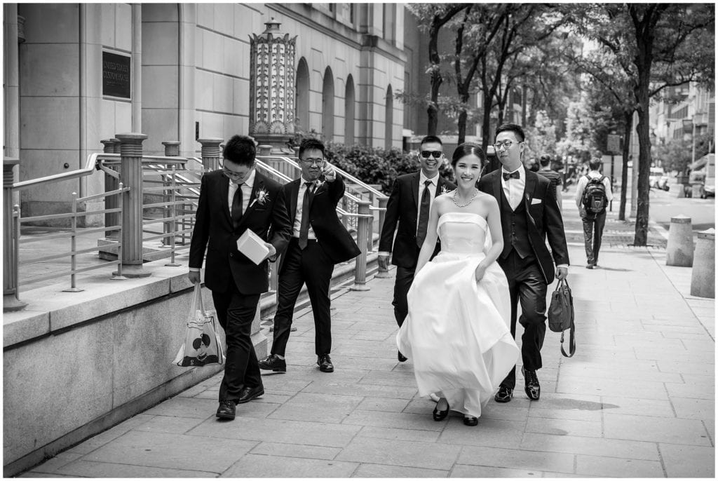 bride and groomsmen walking in Old City Philadelphia black and white