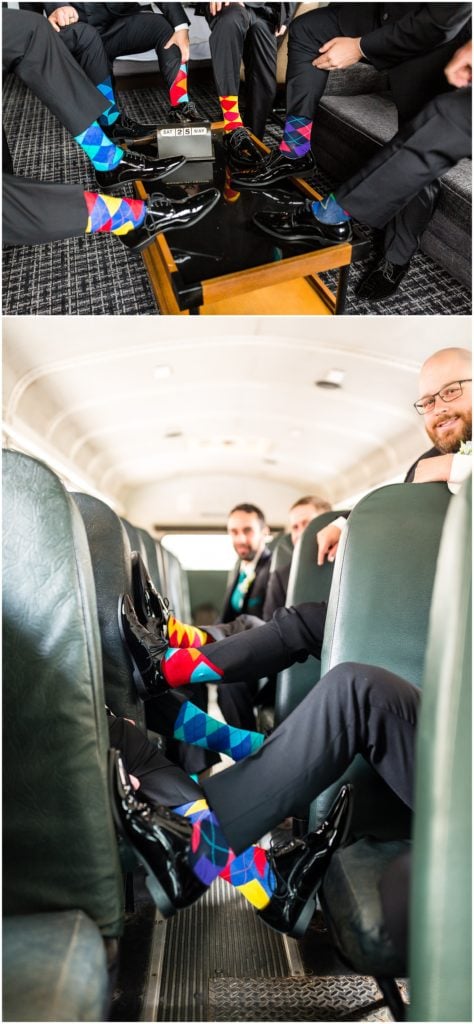 Groomsmen showing off their funky colored socks
