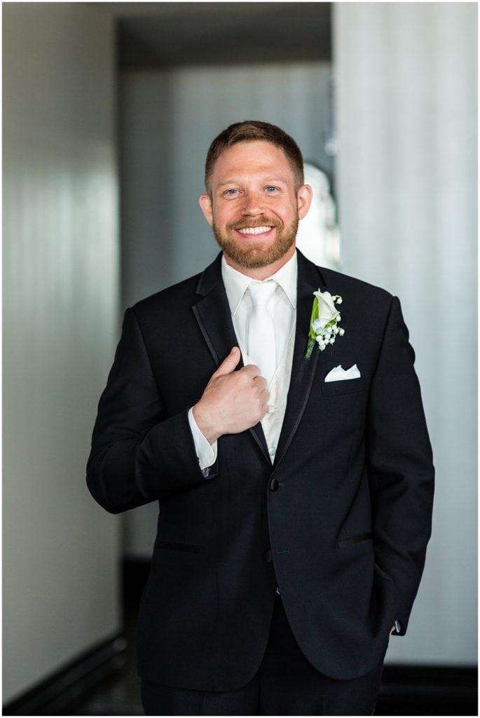 Groom portrait in his hotel room