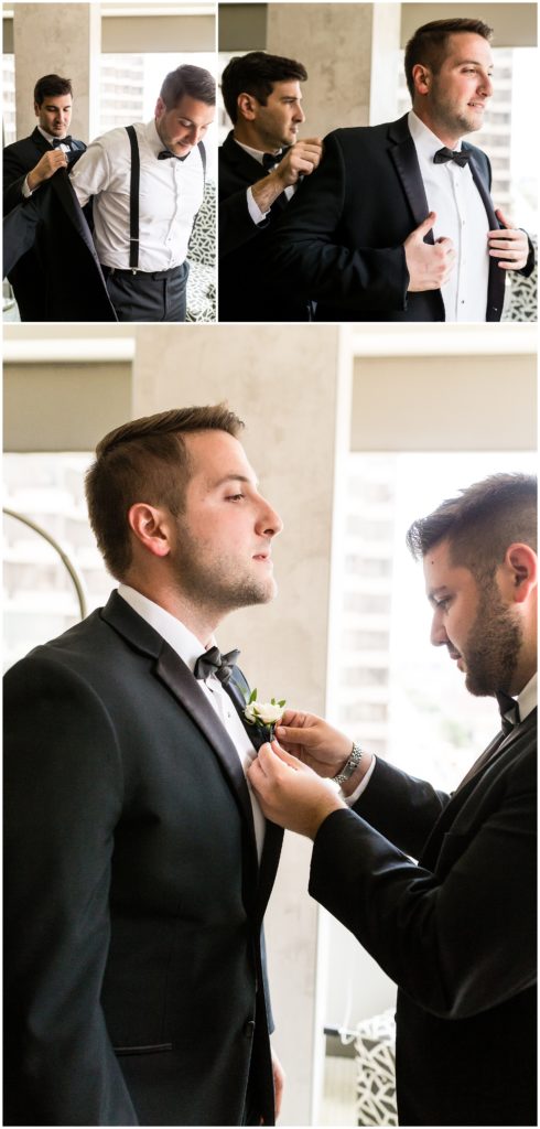 Best men helping groom with final touches at the Cambria Hotel before wedding at the Lucy by Cescaphe