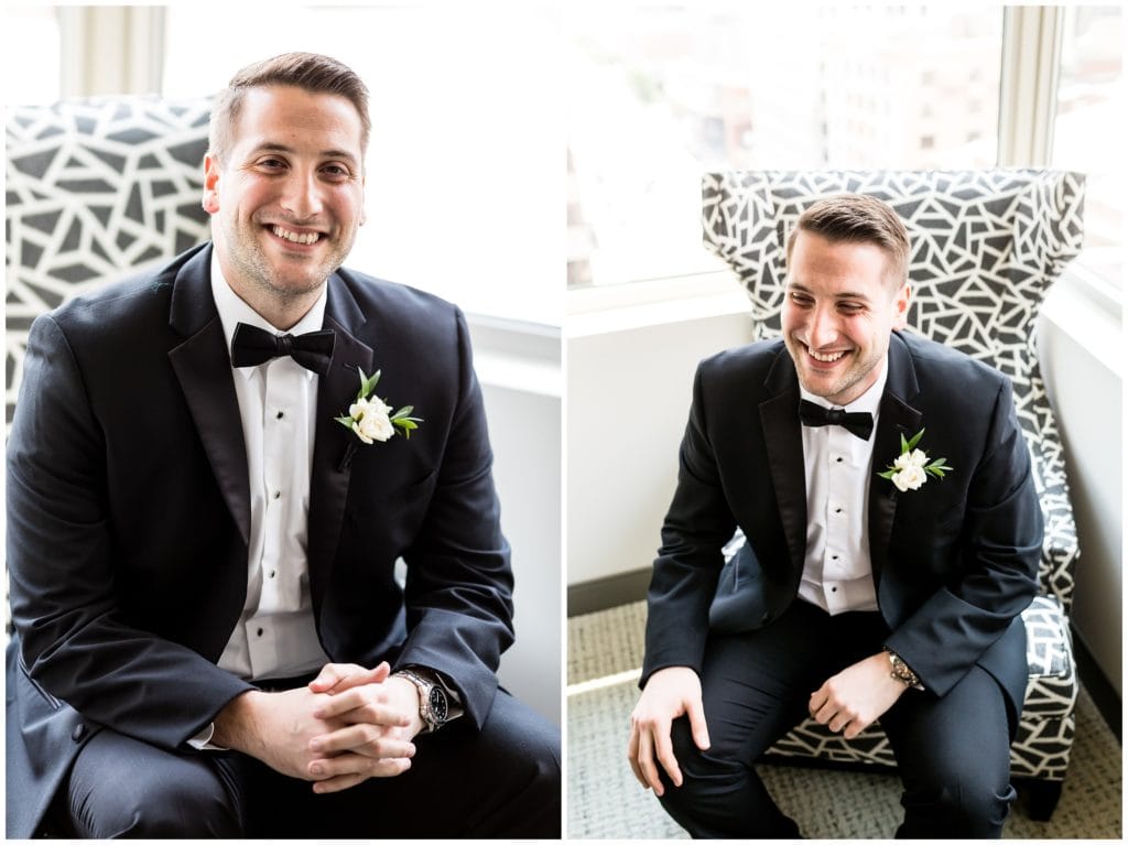 Groom smiling for traditional portrait at the Cambria Hotel before his wedding at the Lucy by Cescaphe