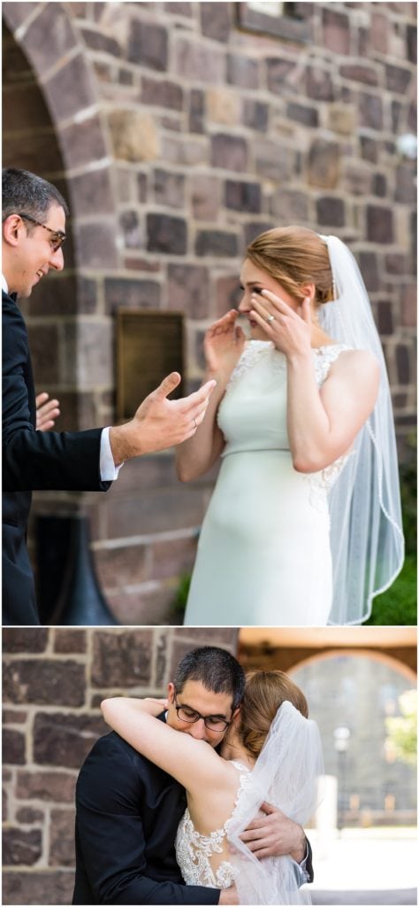 Bride getting emotional during first look with groom in the courtyard of the Michener Museum