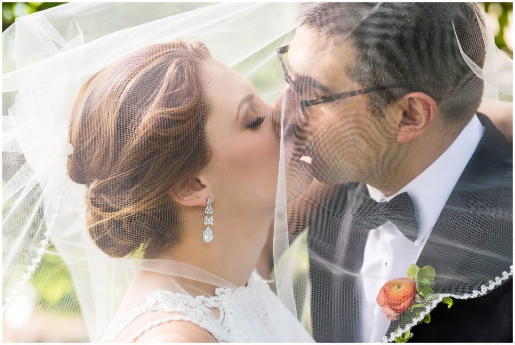Romantic portrait under bride's veil